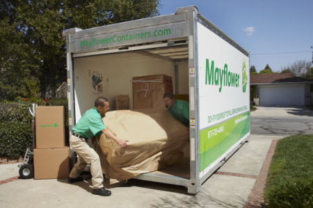 Metcalf Movers loading a Metcalf Moving Container