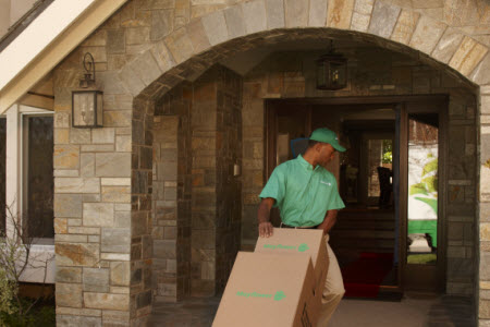 Metcalf Mover moving boxes into house