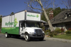 Metcalf Moving Straight Truck in front of house