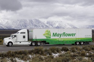 Metcalf Moving Truck on highway with mountains in background