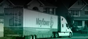 Metcalf Moving truck in front of house