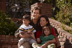 Family on steps of house