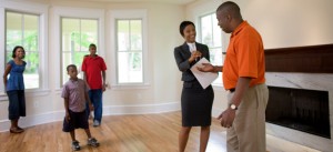 Realtor with family in new home