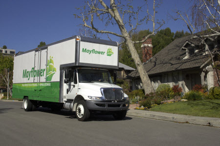 Metcalf Moving Truck in front of house